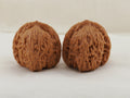 Kuancheng Lion Head walnut pair, 38 mm — WW-00023, hero view.