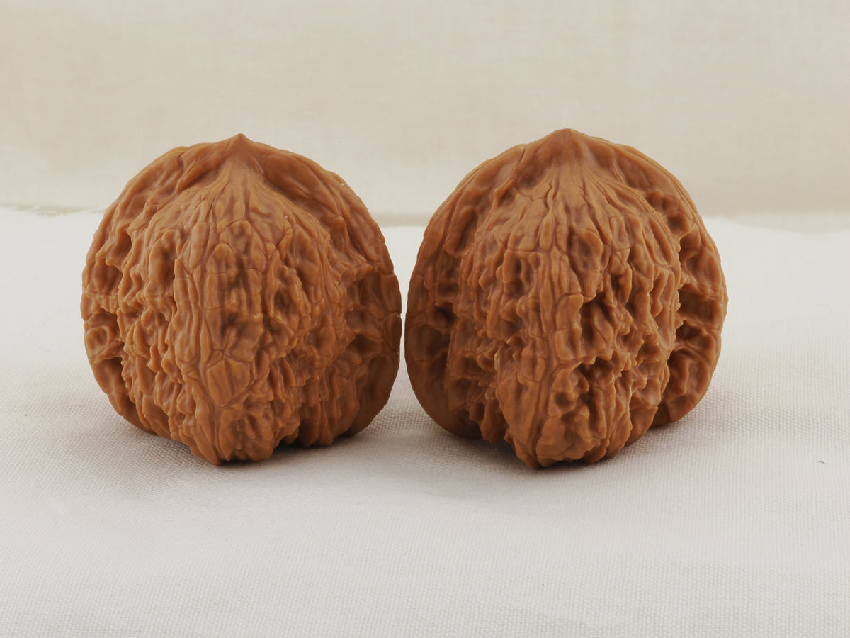 Kuancheng Lion Head walnut pair, 38 mm — WW-00023, hero view.