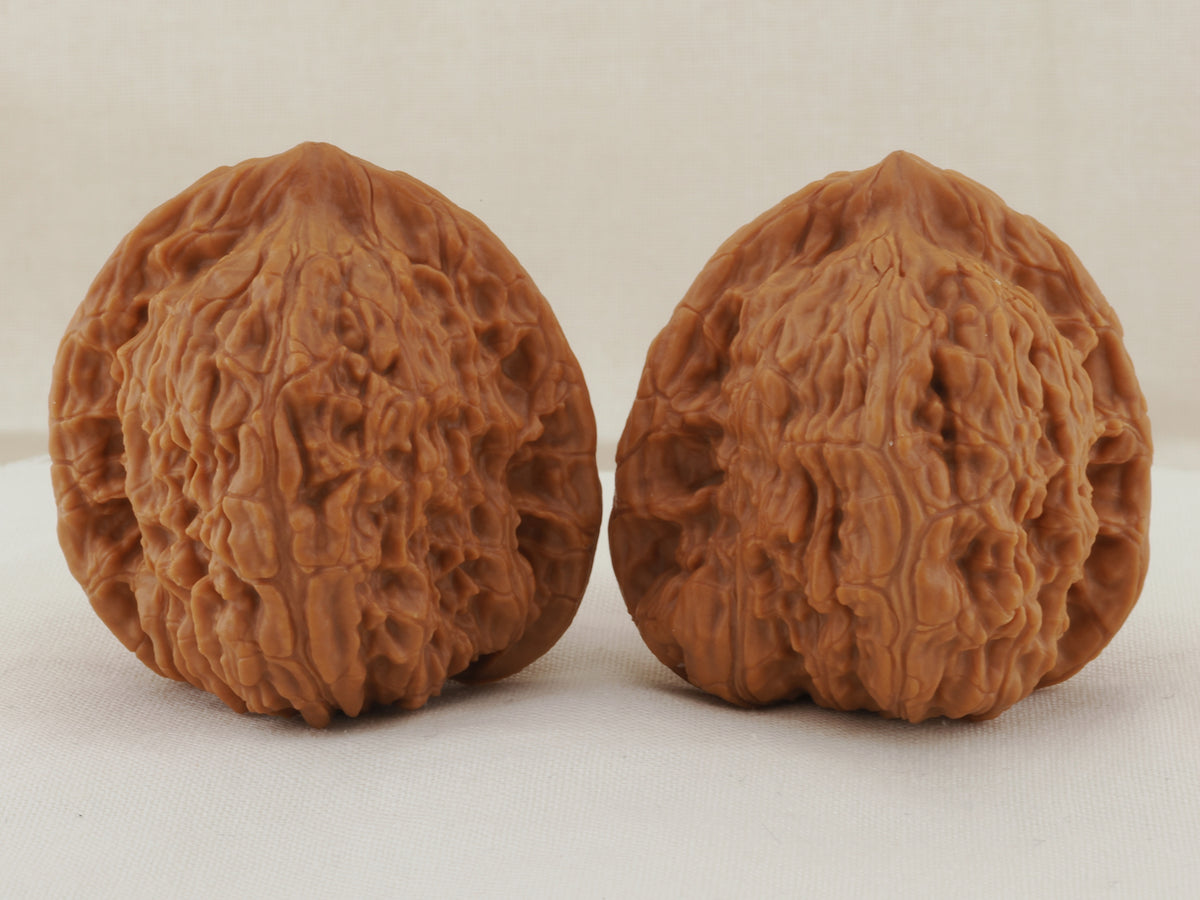 Kuancheng Lion Head walnut pair, 40 mm — WW-00024, hero view.