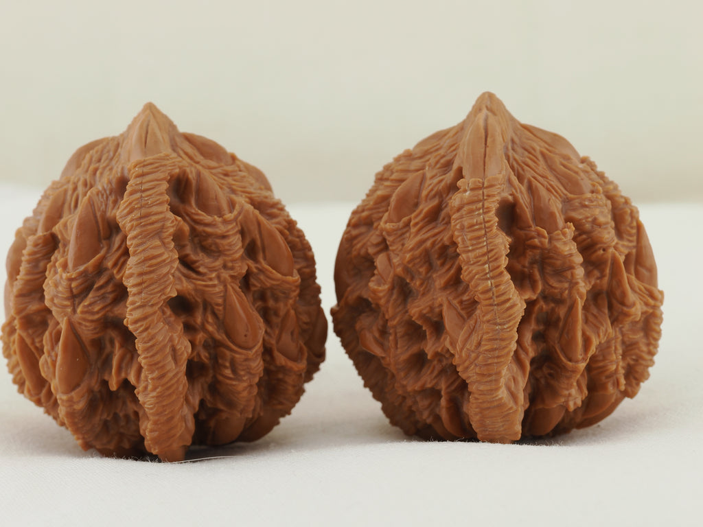 Tiger Head Devour Carved Walnut Pair — 41.0 mm (Hu Tou Tun Shi) — Side view — WW-00045