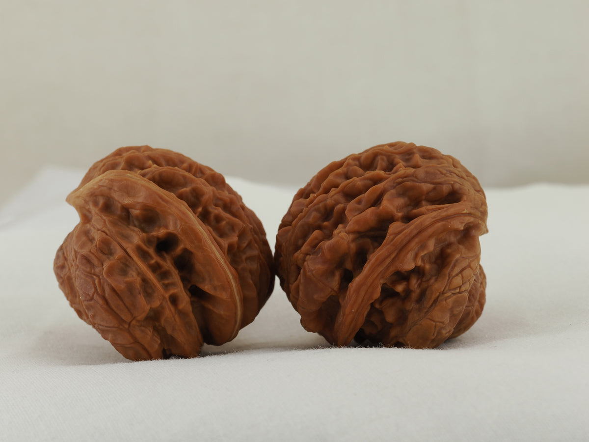 Flying Serpent Palace Lantern Walnut Pair — 39.0 mm (Gong Deng Fei She) — Three-quarter view — WW-00051