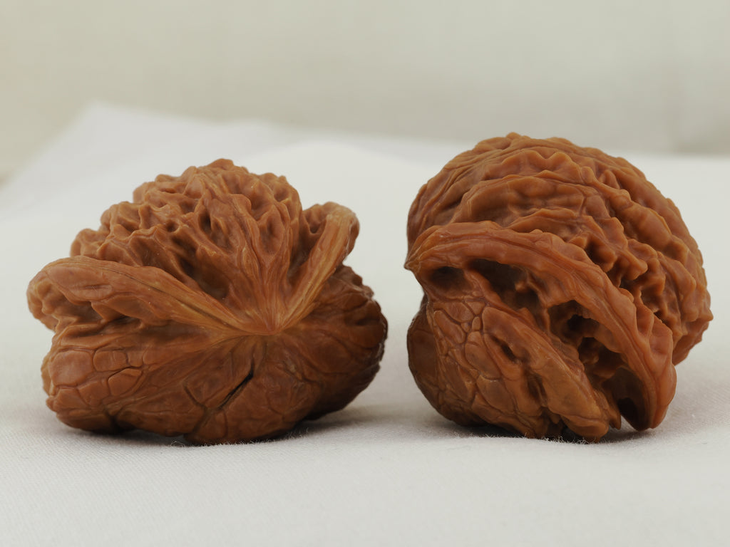 Flying Serpent Palace Lantern Walnut Pair — 39.0 mm (Gong Deng Fei She) — Front three-quarter view — WW-00051