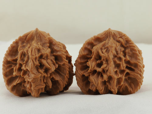 Empire Three Ridge Devour Carved Walnut Pair — 50.0 mm (Di Wang Tun Shi) — Front view — WW-00052