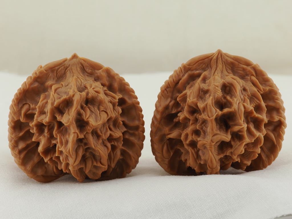 Empire Three Ridge Devour Carved Walnut Pair — 50.0 mm (Di Wang Tun Shi) — Side view — WW-00052