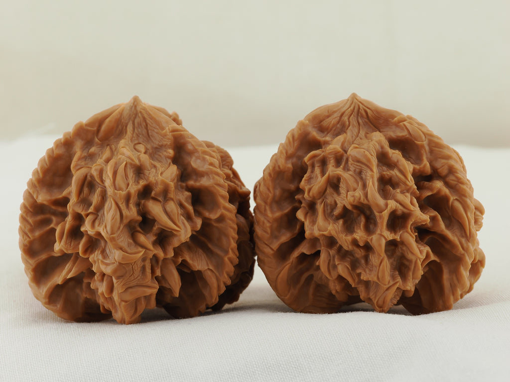 Empire Three Ridge Devour Carved Walnut Pair — 50.0 mm (Di Wang Tun Shi) — Additional front view — WW-00052